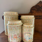 Set of 4 Home Sweet Home Ceramic Canisters w/ Cross-stitch pattern