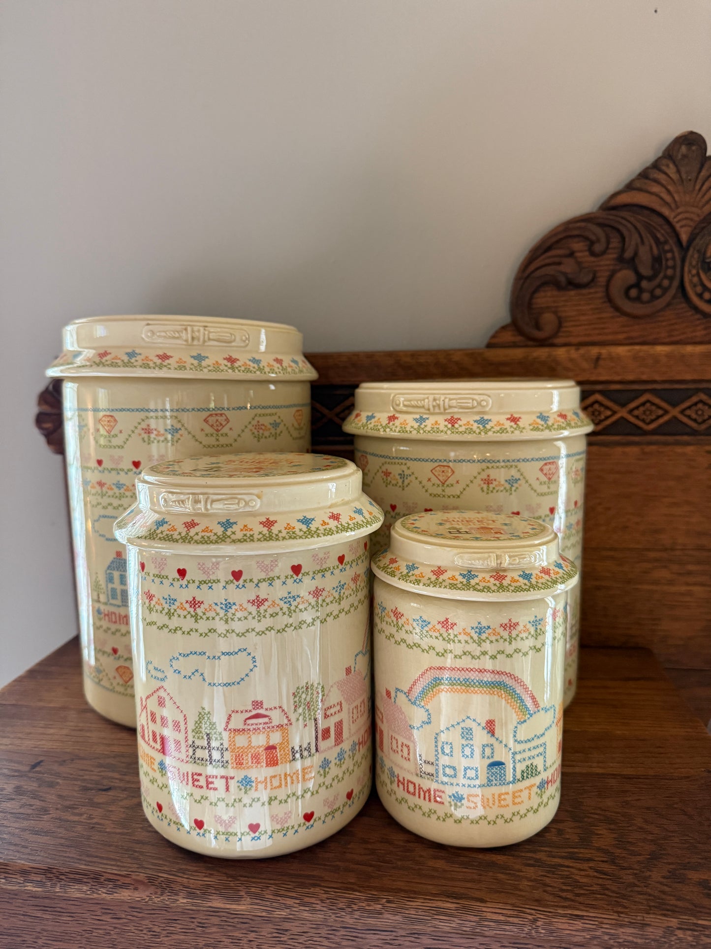 Set of 4 Home Sweet Home Ceramic Canisters w/ Cross-stitch pattern