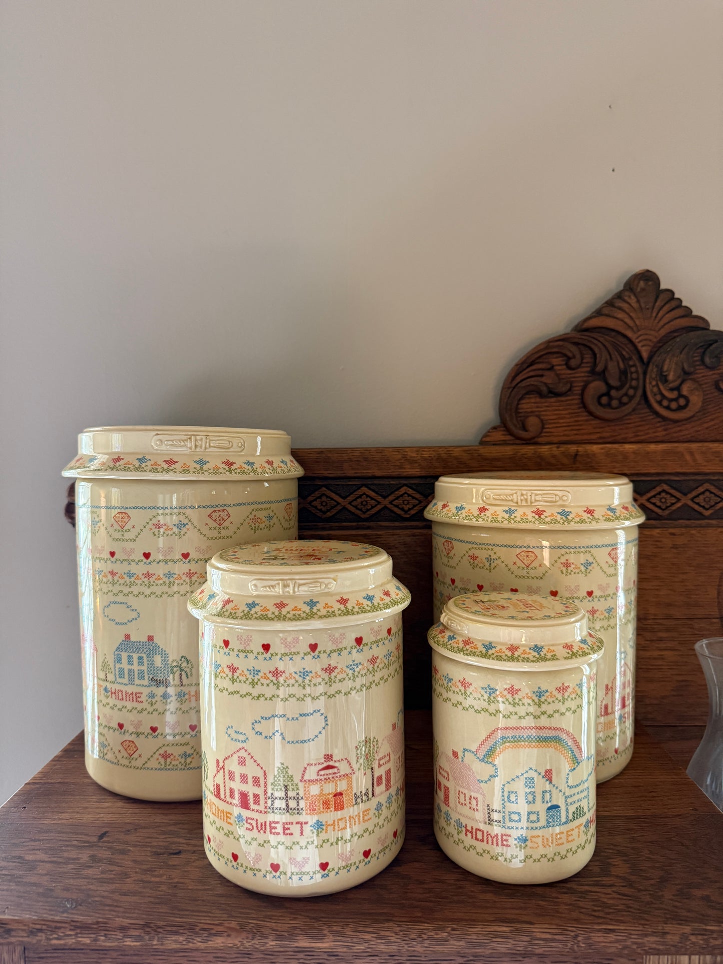 Set of 4 Home Sweet Home Ceramic Canisters w/ Cross-stitch pattern